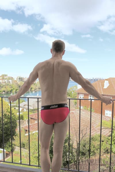 male model on balcony in AussieBum underwear